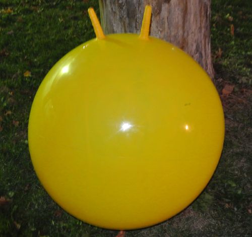 yellow 32 inch stick handle space hopper